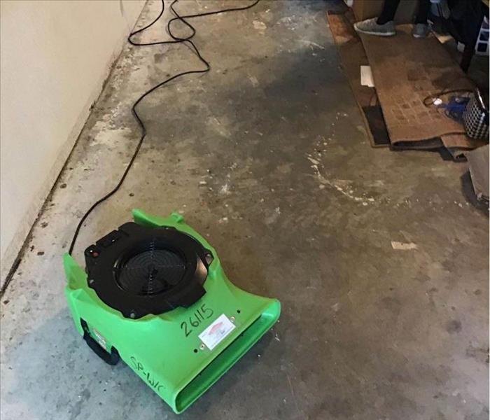 Air movers on floor.
